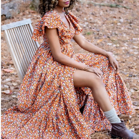 Beautiful NWT wrap dress with tiered sleeves and deep pockets. - Picture 2 of 7